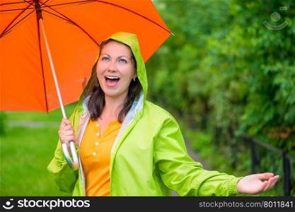 pretty girl who likes to walk under summer rain