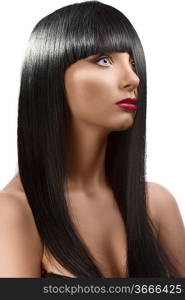 pretty girl with long, dark smooth hair and fringe, she is turned of three quarters at left and her half face is hidden by the hair