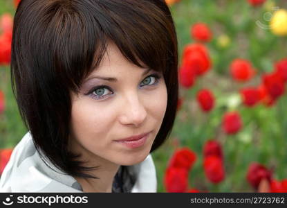 Pretty girl with tulips with soft background