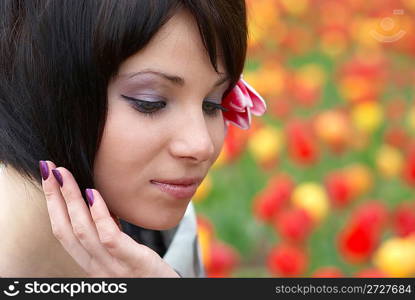 Pretty girl with tulips with soft background