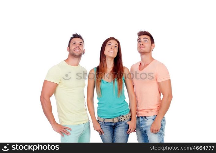 Pretty girl with two handsome boys looking up isolated on a white background