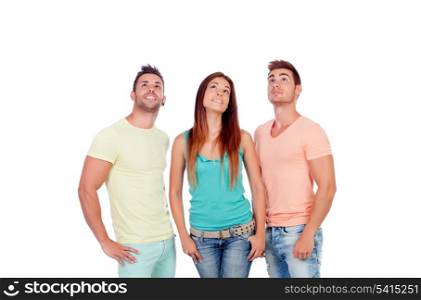 Pretty girl with two handsome boys looking up isolated on a white background