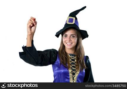 Pretty girl with witch costume writing isolated on white