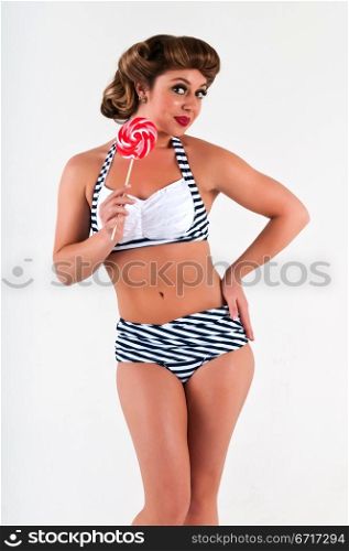 Pretty Hispanic woman in a vintage bikini