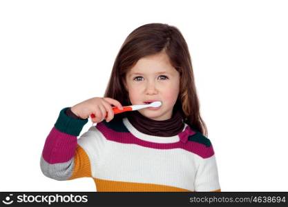 Pretty little girl brushing teeth isolated on white background