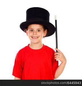 Pretty little girl doing magic with a top hat and a magic wand isolated on a white background
