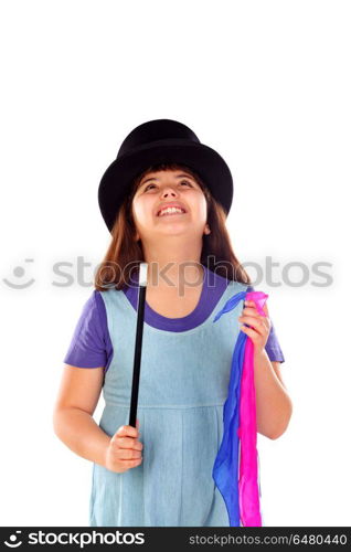 Pretty little girl doing magic with a top hat and a magic wand . Pretty little girl doing magic with a top hat and a magic wand isolated on a white background