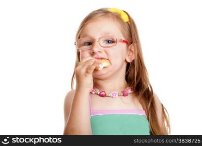 Pretty little girl in glasses eating a bread doing fun isolated on white background