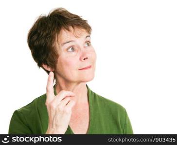 Pretty middle-aged woman has a bright idea. Isolated on white.