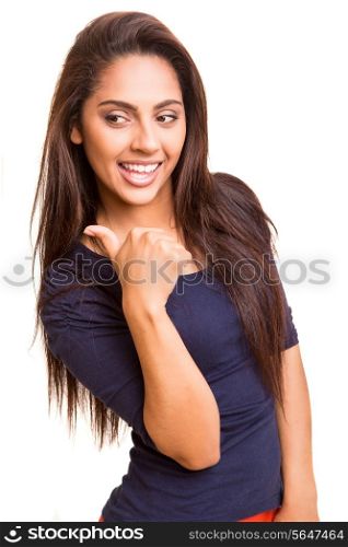 Pretty mix race woman pointing with her arm over white background