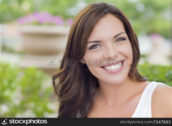 Pretty Mixed Race Girl Portrait Outdoors at the Park.