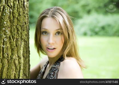 Pretty Model On The Nature Background