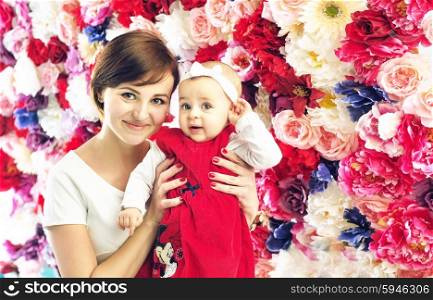 Pretty mom with smling, cute baby