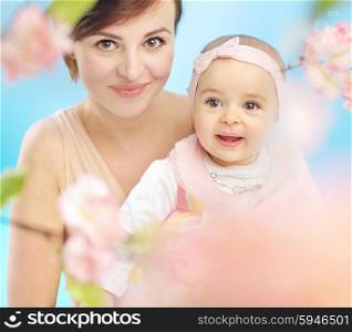 Pretty mother with cute little child