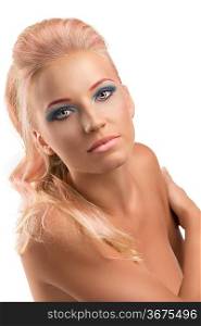 pretty naked girl with blonde long hair and coloured make-up, she looks in to the lens