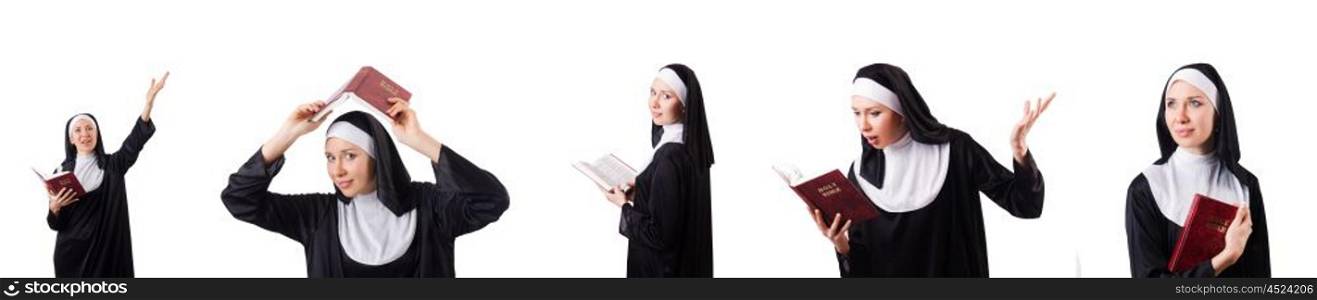 Pretty nun with Bible isolated on white