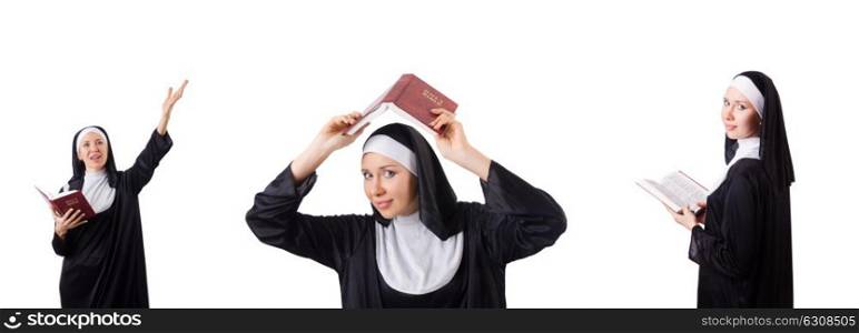 Pretty nun with Bible isolated on white