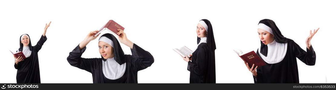 Pretty nun with Bible isolated on white