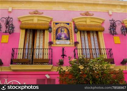 Pretty pink house with medinaceli christ lord of almeria