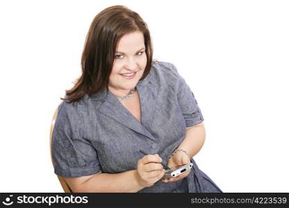 Pretty plus sized businesswoman checking appointments on her PDA. Isolated on white.