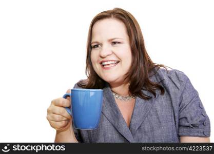 Pretty plus sized businesswoman having coffee and talking with a friend off camera. Isolated on white.