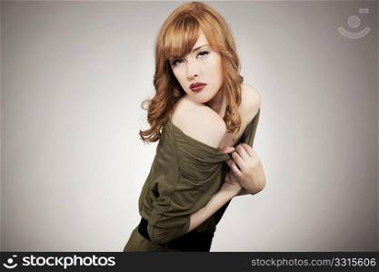 Pretty redhead woman posing
