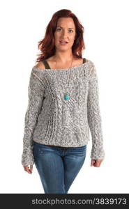 Pretty redheaded woman in a gray sweater