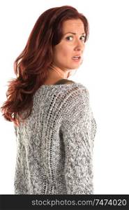 Pretty redheaded woman in a gray sweater