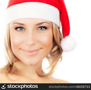 Pretty Santa girl, closeup portrait of a young woman smiling, wearing Christmas hat, winter holidays fun, female face isolated over white background