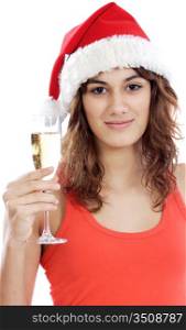 Pretty santa girl holding a glass of champagne