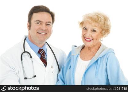 Pretty senior woman with her friendly, caring doctor. Isolated on white.