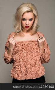 Pretty slender blonde in a vintage ruffled blouse