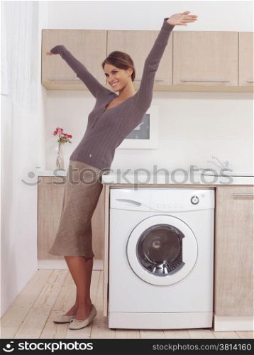 pretty smiling woman in the laundry room