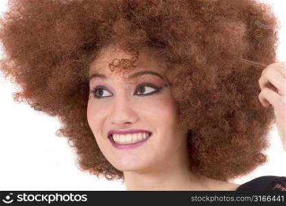 Pretty teen with a red afro wig