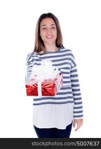 Pretty teenager girl with a red present isolated on a white background