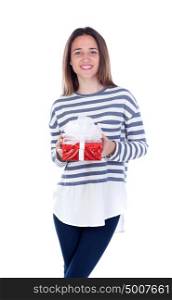 Pretty teenager girl with a red present isolated on a white background