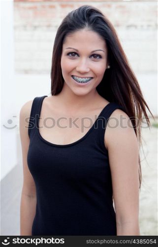 Pretty teenager girl with brackets smiling