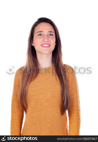 Pretty teenager girl with sixteen years old looking up isolated on a white background