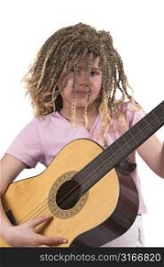 Pretty ten year old girl with rasta curls playing her guitar