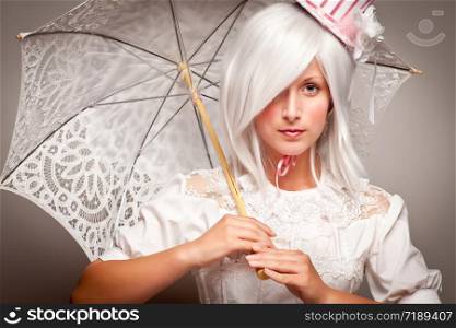 Pretty White Haired Woman Wearing Classic Dress with Parasol and Small Top Hat.