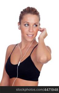 Pretty woman doing fitness istening music with headphones on white background isolated&#xA;