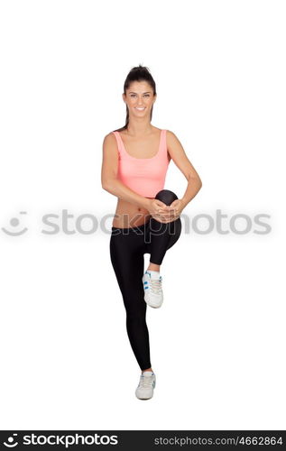 Pretty woman doing stretching into her workout isolated on white background