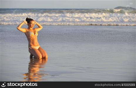Pretty woman enjoying the beach in Buzios, Brazil