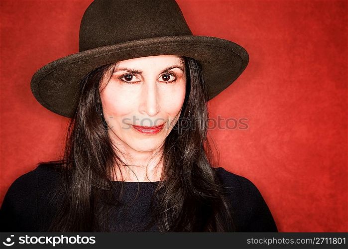 Pretty woman in a dark hat