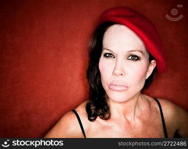 Pretty woman in a red beret