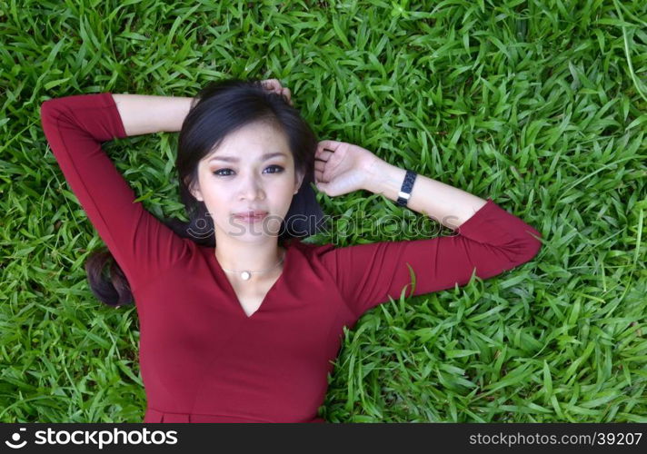 pretty woman in red dress at the garden