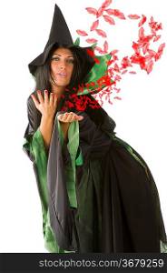 pretty woman in witch dress giving a lot of kisses