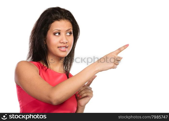 Pretty woman pointing at empty blank copy space.. Pretty mixed race woman pointing at empty blank copy space. Girl isolated on white. Advertisement.