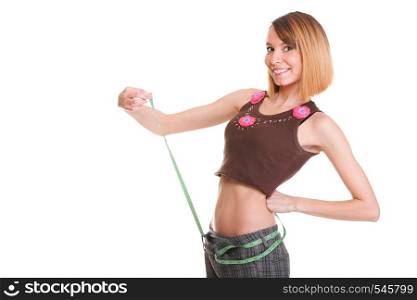 Pretty woman shows her weight loss wearing measure tapes isolated on white