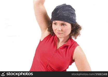 Pretty woman stretching her muscles after exercise
